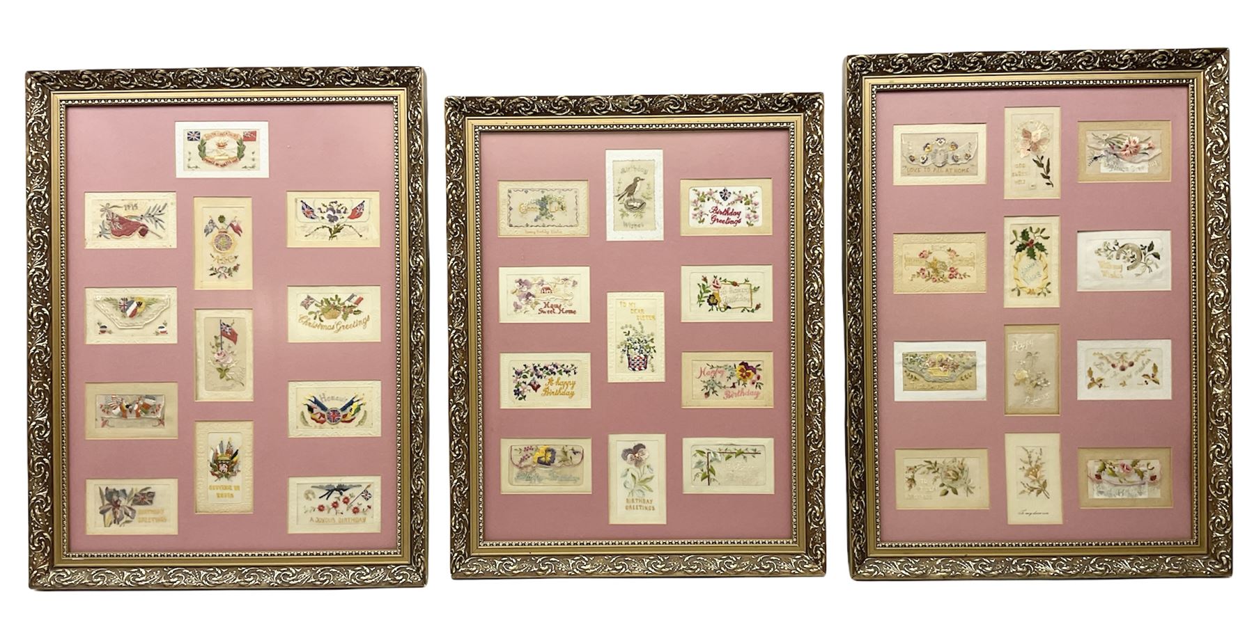 Thirty-five WW1 embroidered silk postcards including regimental crests, flags of the Allies, envelope type with greeting card inserts, Christmas and birthday cards etc; mounted and glazed in three graduated modern matching gilt frames (3)