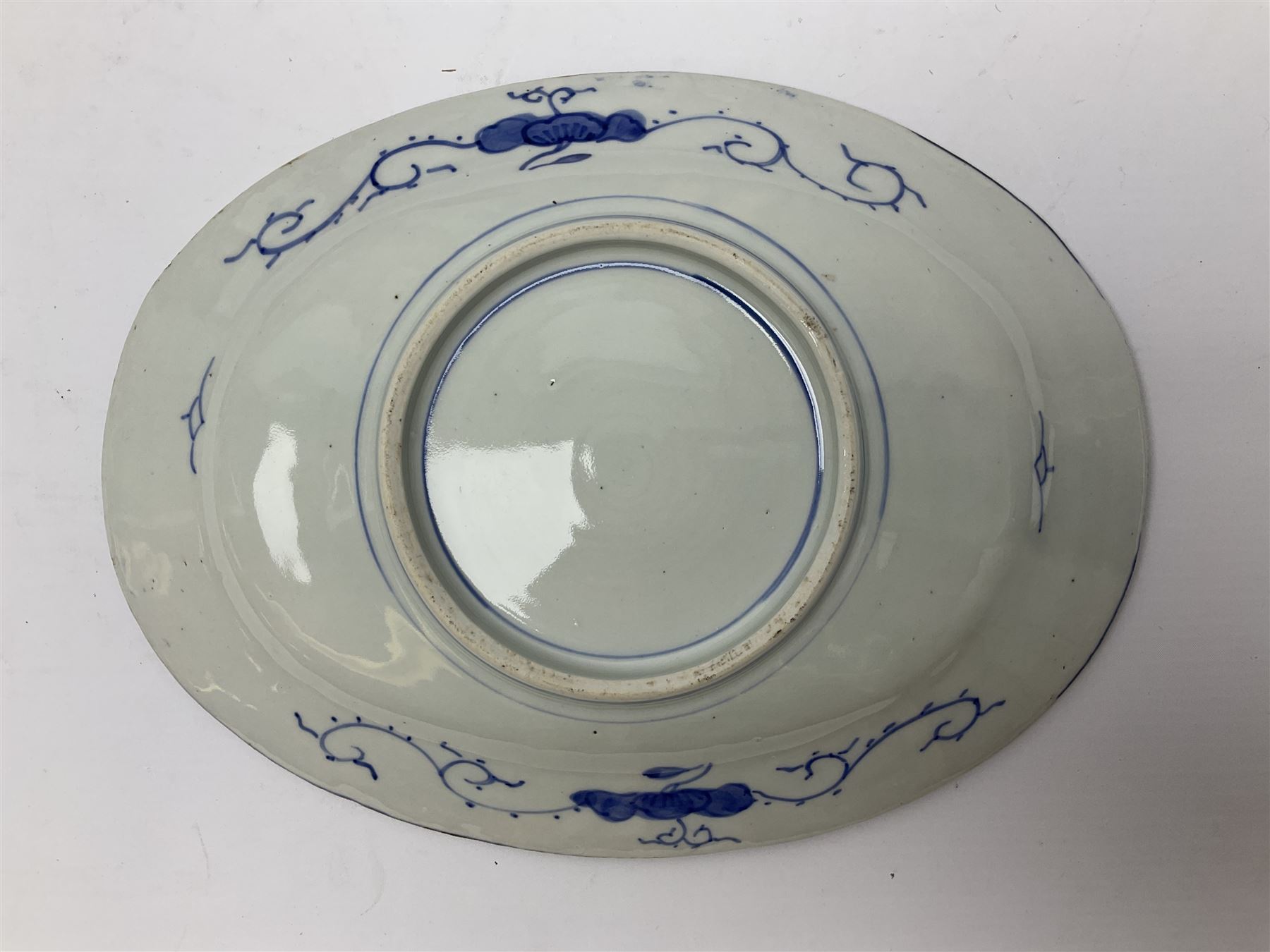 Two 19th century Japanese Imari pattern oval charger together with another circular Imari charger, circular charger D31cm 