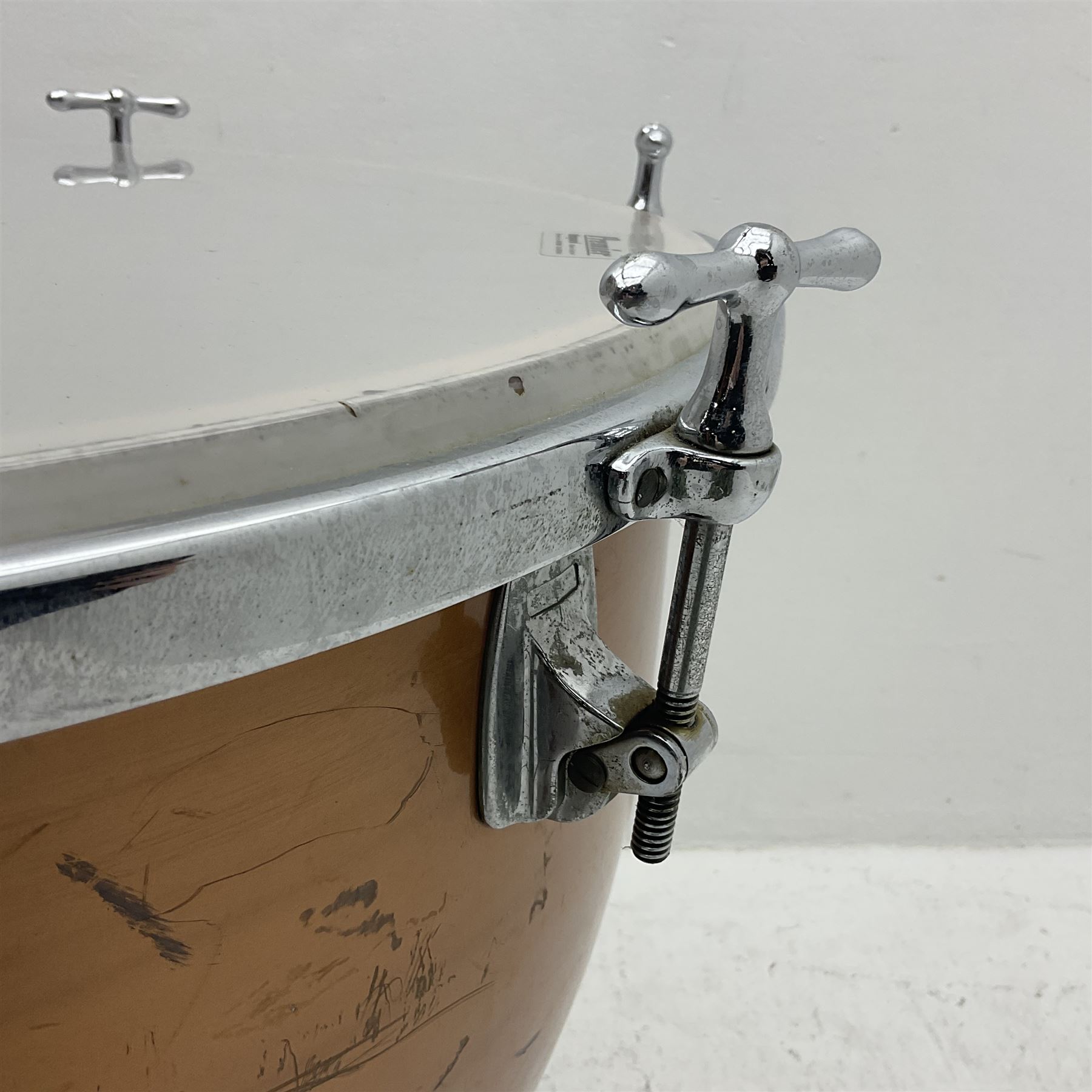 Timpani drum with coppered finish to the bowl, marked 'BS 3499' underneath, three adjustable tubular legs and Premier head D67cm