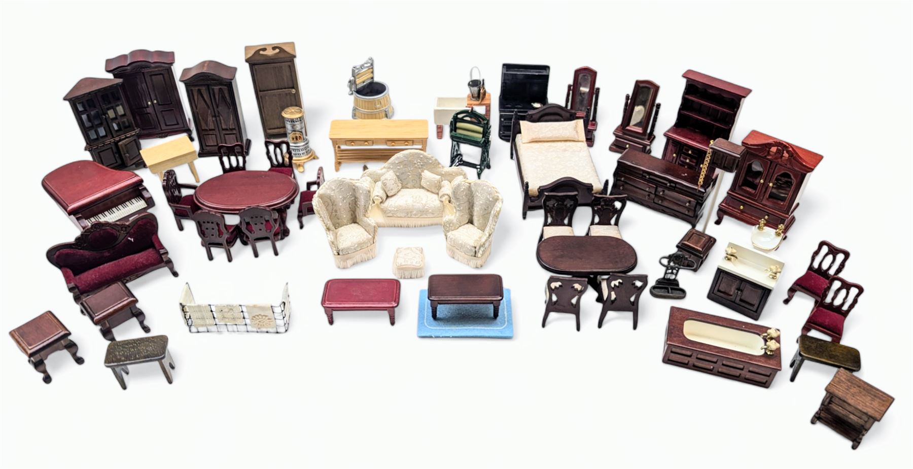 1:24 scale dolls house furniture, comprising stove, mangle, couch and arm chairs, bed, bathroom suite, two dining tables with chairs, side tables, cabinets, dressers, etc 