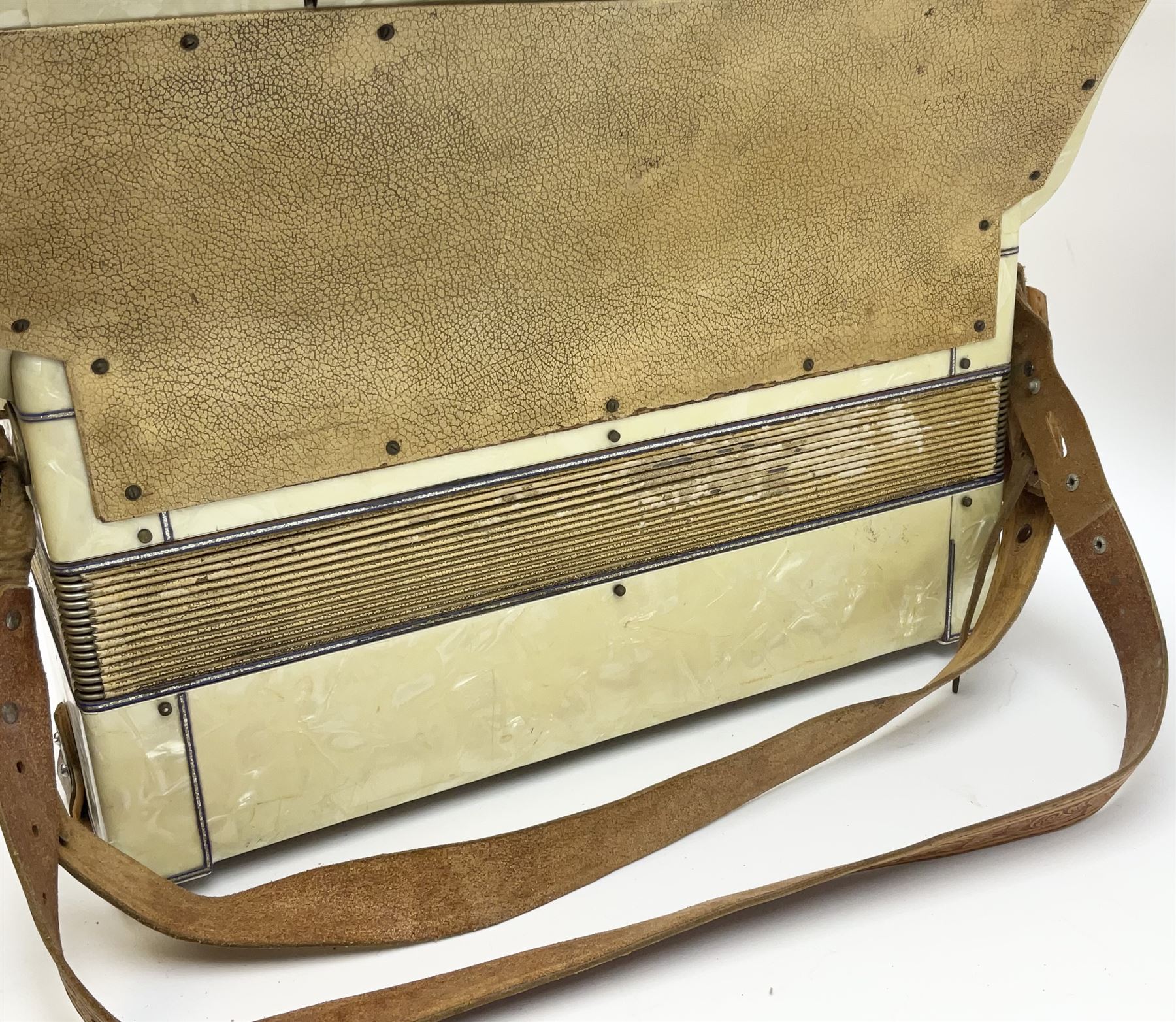 Italian Lambardi piano accordion in ivory coloured pearline case with jewelled decoration, twenty keys and one-hundred and twenty buttons L 37cm