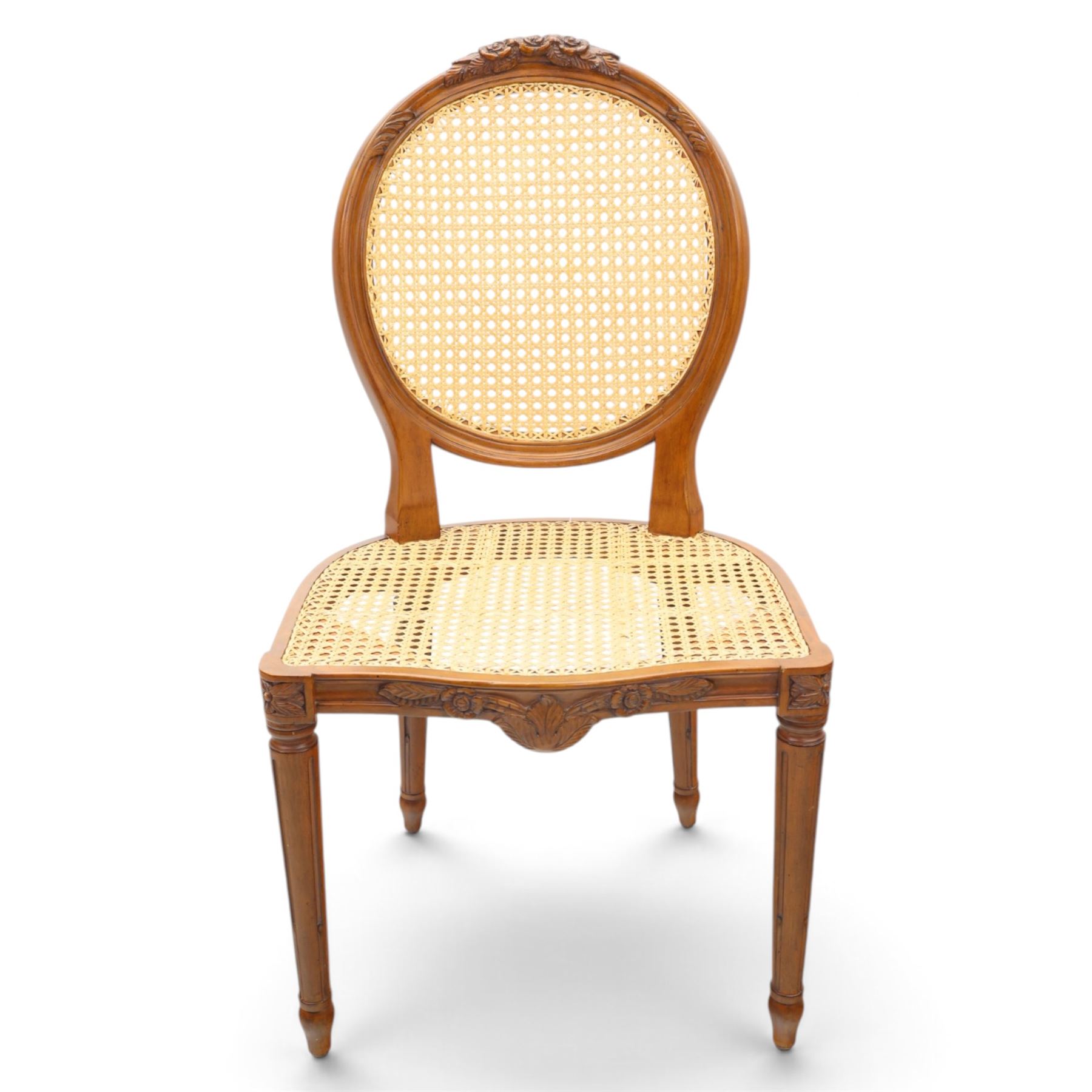 And So To Bed - French design 'Floral Caned Chair', balloon caned back with foliate carving, above a caned serpentine seat, reeded and turned supports