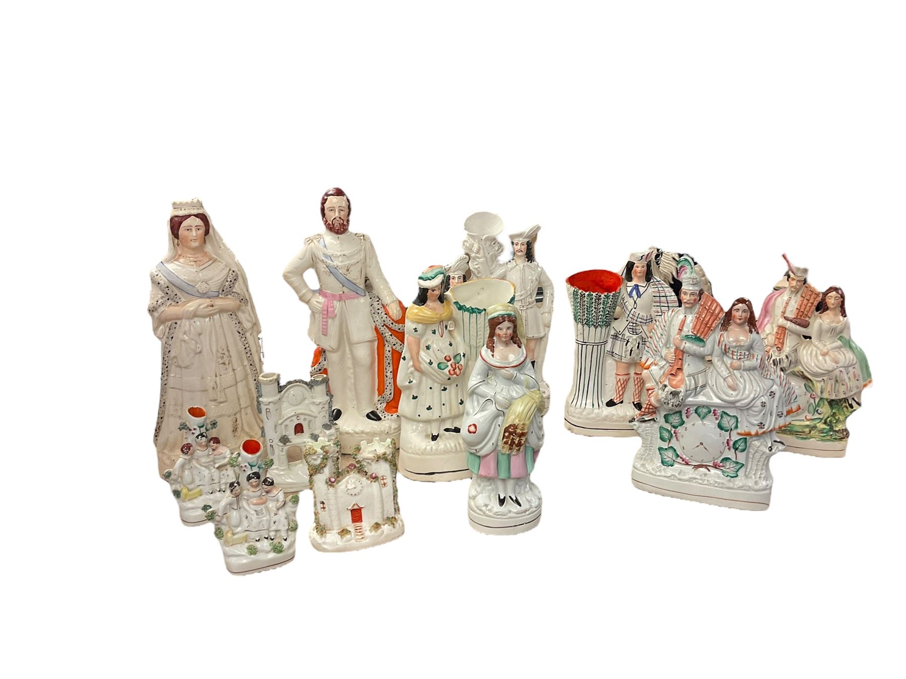 Pair of Staffordshire figures of The Queen of England and The Prince of Wales together with other Staffordshire figures 