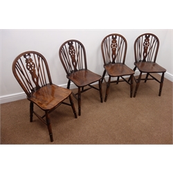  Late 20th century set four elm and beech wheel back chairs  