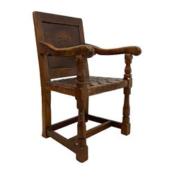 Mouseman - circa. 1930s set of six (4+2) oak dining chairs, panelled back carved with the Bagshawe family crest, the moto 'Forma Flos Fama Flatus' over an arm grasping a bugle-horn with ribbon tie and Yorkshire rose motif, adzed frame, leather lattice strap seat, on octagonal supports united by stretchers, two carvers and four side chairs, each carved with mouse signature, by Robert Thompson of Kilburn 

Provenance: Owned since manufacture by the Bagshawe family, descendants of the Staithes Group Artist Joseph Richard Bagshawe RBA (1870-1909).