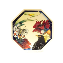  Moorcroft Designers Medley octagonal plate with bird, butterfly and stylised flowers, the reverse signed by various Moorcroft designers including Emma Bossons, Rachel Bishop, Kerry Goodwin etc & Hugh Edwards the Chairman of Moorcroft, dated 2007, 24.5cm x 24.5cm   