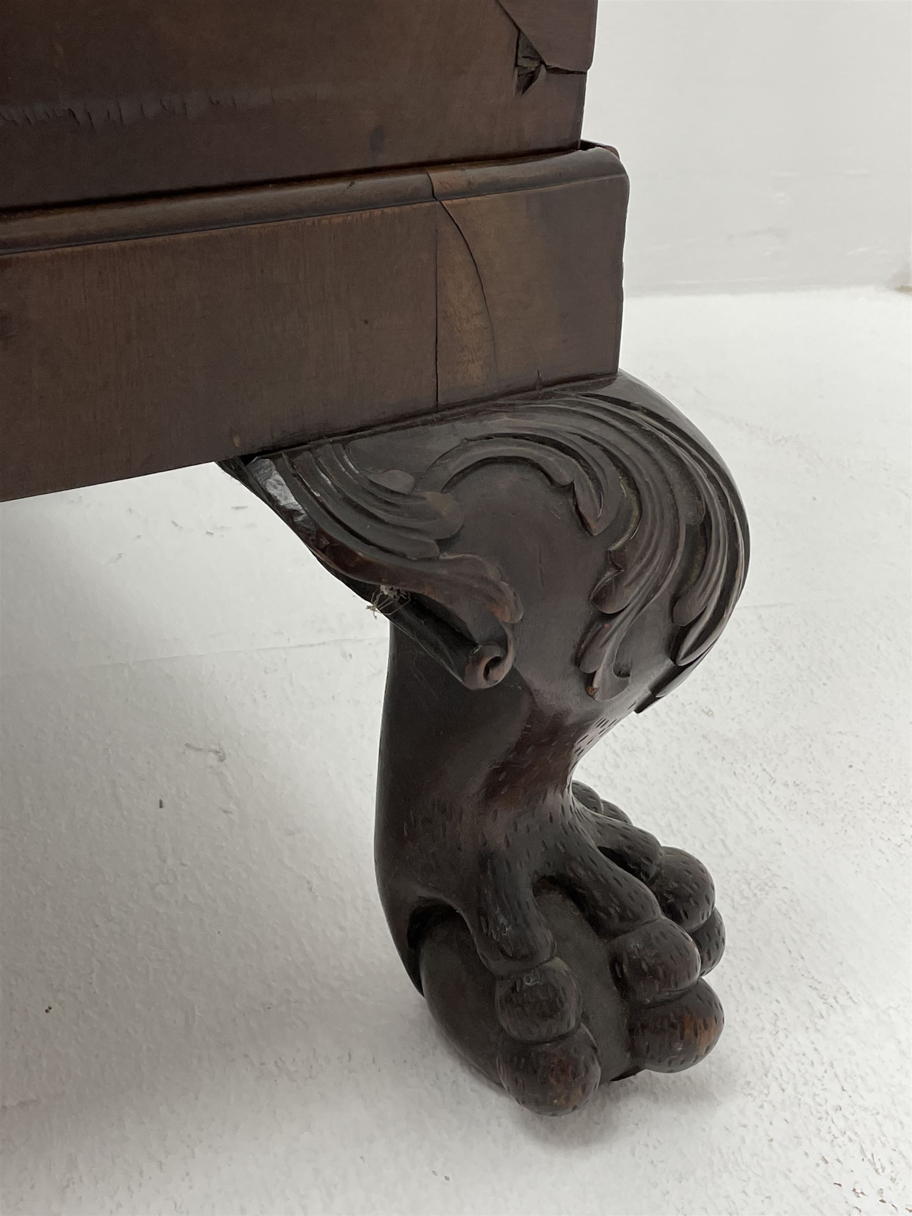 19th century camphor wood and mahogany silver chest, the hinged banded top with circular brass mounts which secure the interior strap hinges, fretwork metal strapping to the corners, on stand with plain frieze and acanthus carved cabriole ball and claw feet