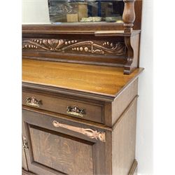 Arts and Crafts period oak mirror back dresser, projecting cornice above rectangular bevelled mirror and shelf, two turned supports, inset copper panel with embossed decoration, rectangular moulded top over two drawers and two panelled cupboard, moulded plinth base, brass and copper strappings and handles 
