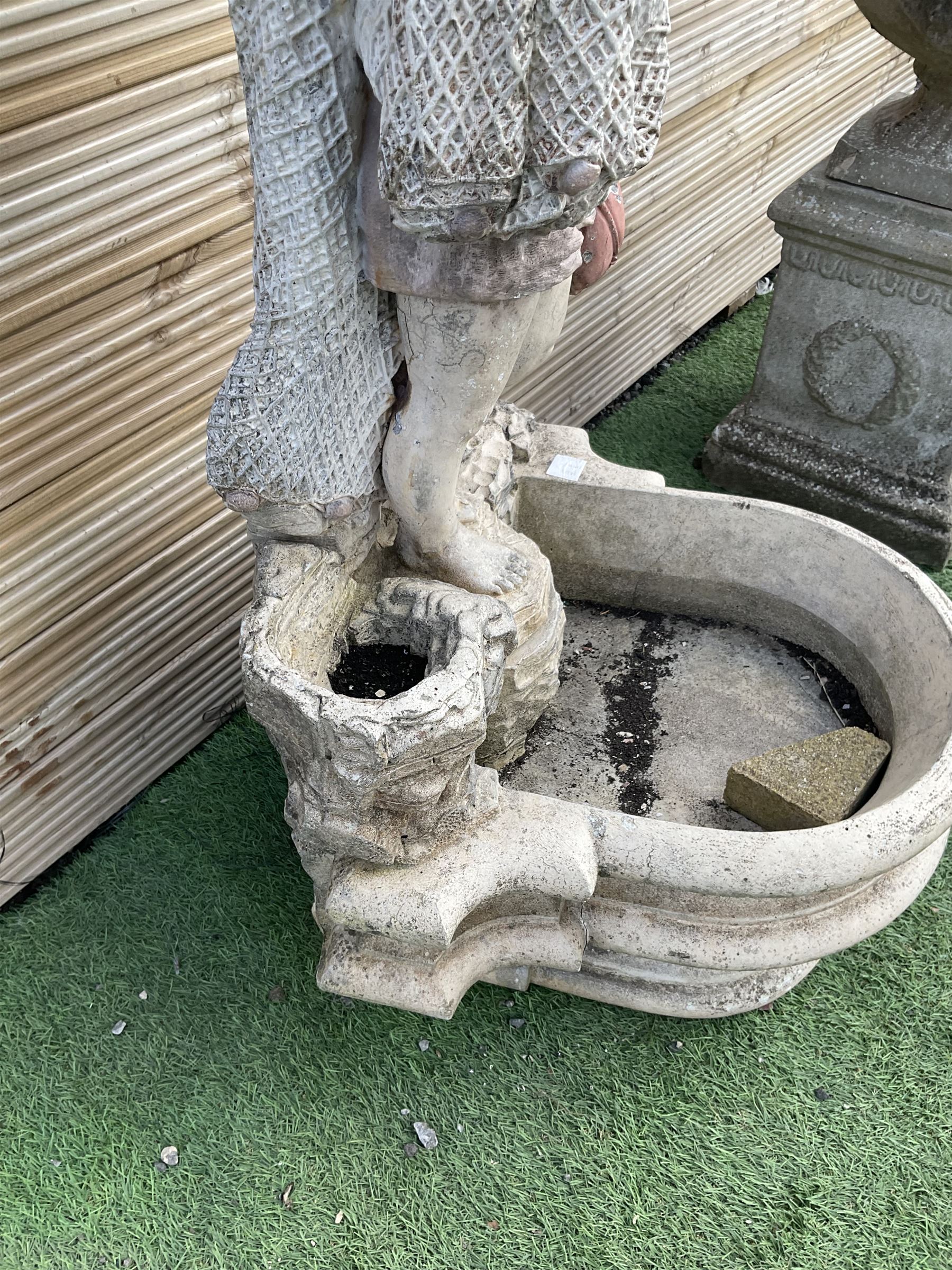 Three section cast stone garden figure of a boy carrying fishing net and a satchel with a water feature together with a cast stone planter on plinth - THIS LOT IS TO BE COLLECTED BY APPOINTMENT FROM DUGGLEBY STORAGE, GREAT HILL, EASTFIELD, SCARBOROUGH, YO11 3TX
