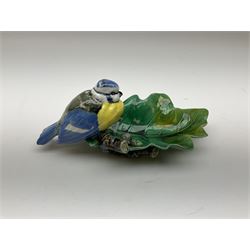 Minton majolica leaf dish, modelled as a Blue Tit perched on a branch with acorns and an oak leaf, date cypher for 1868, impressed marks beneath, L21cm. 