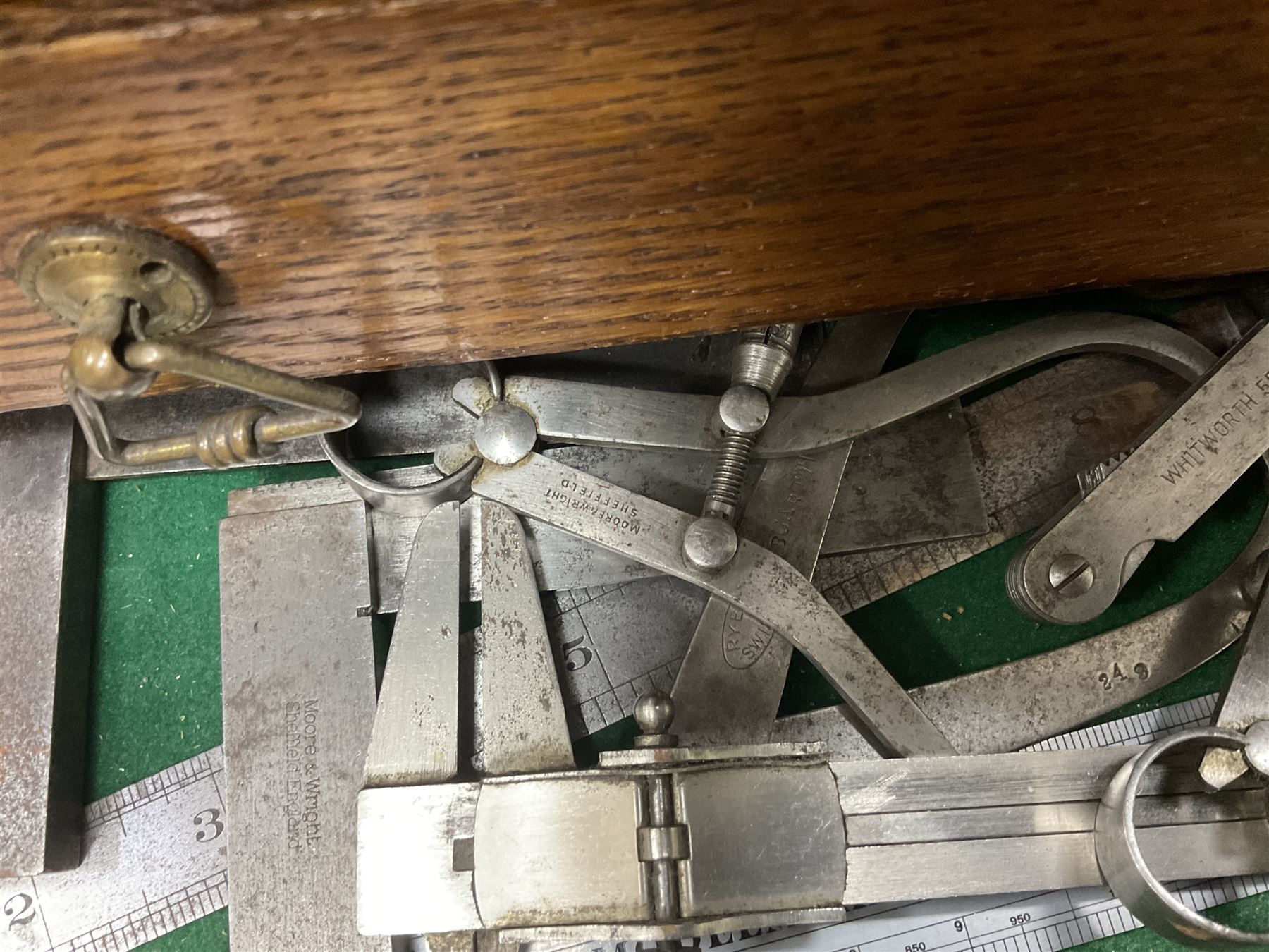 Six shelved cabinets for displaying ‘00’ gauge locomotives comprising plain plywood and white painted examples with track applied to various shelves, largest H63cm, W107cm, D27cm; Collection of tools for building model locomotives to include Weller PU-2D Soldering Pencil and Standard Tip Soldering Iron 20W/230V, Humbrol Modellers Airbrush, Power Supply Units and two wooden chests one of which housing a collection of tools including tweezers, scalping tools, wrenches etc 