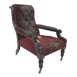  19th century mahogany framed library armchair, scrolled deep buttoned back and open arms on lobed tapering supports with brass sockets and castors, H93cm, W65cm, D90cm  