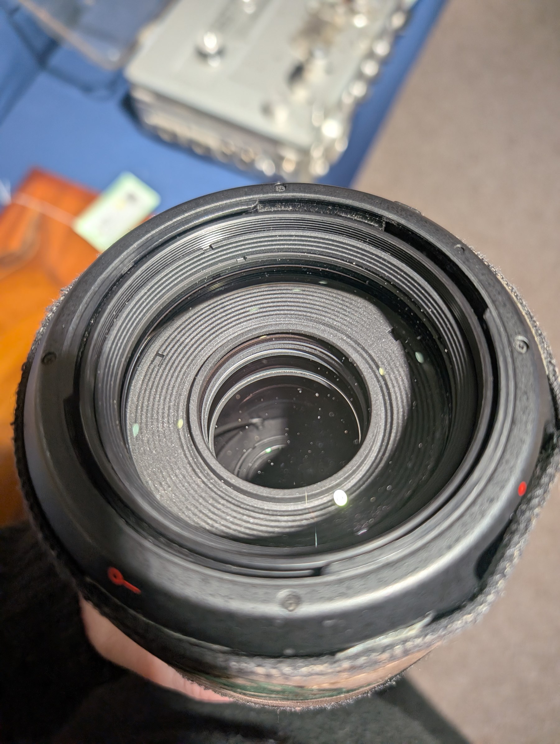 Canon EF 100-400mm f/4.5-5.6L Image Stabilising Ultrasonic camera lens serial no. 4710001538, with camouflage cover and lens case, boxed with instructions