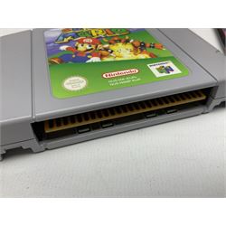 Nintendo 64 games, ‘Super Mario 64’ (1996) and ‘Mario Kart 64’ (1997), both with original boxes and instruction manuals, with two Nintendo 64 red controllers in original boxes. Also including a 4 MEG memory card