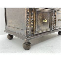 18th century oak chest, moulded rectangular top over three drawers, the front decorated with split mouldings, on turned bun feet