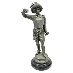 Spelter figure modeled as Cavalier with a raised sword, upon a circular base, H52cm