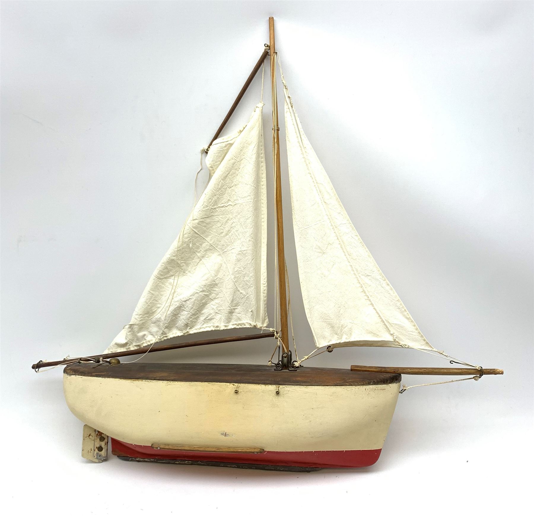 Schooner style pond yacht with cream and red painted wooden hull with lead weighted keel and working rudder and pine deck L83cm H79cm