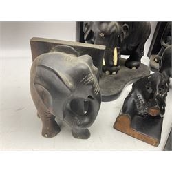 Three pairs of carved wooden elephant bookends, and a similar carved wooden elephant figure, tallest H24cm