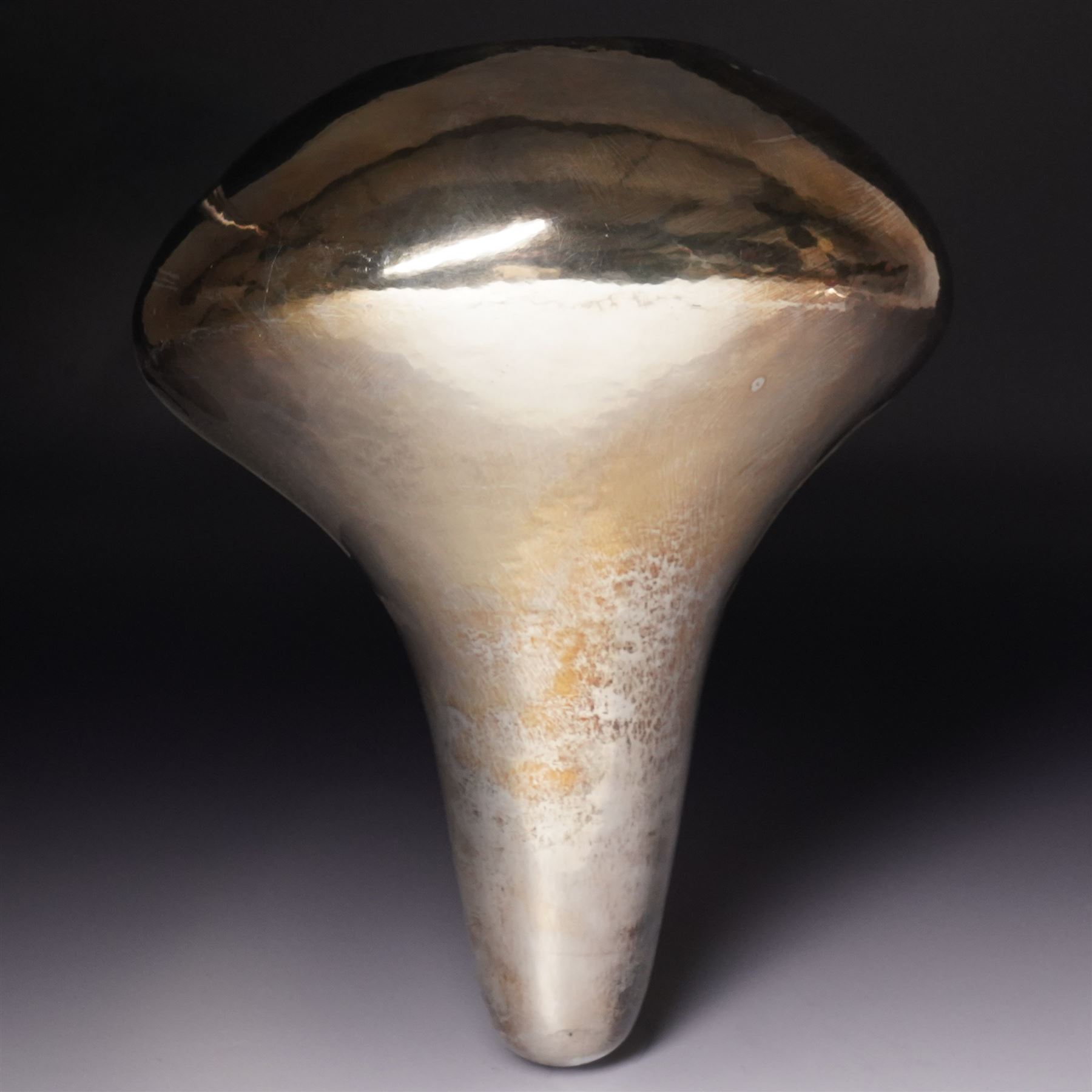 Sarah Denny (Northern British 1982-): silver 'Gathering Vessel' Britannia silver sculpture, Sheffiled 2009 

Artists notes: 'This vessel centres on the most fundamental narrative of a simple gathering of growth. A cone-like form opens wide. Extending outward, tilting upward, reaching out wholly in full circle form to gather all she can from the source above..'
