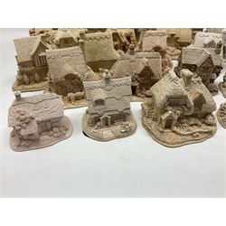 Twenty-three Lilliput Lane models from the Paint Your Own collection, to include Catmint Cottage, Sugar and Spice, Gypsy Cottage, Ruby Cottage and Little Birch, some boxed