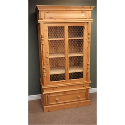  Handmade pine mesh-fronted cupboard, projecting cornice above single door with wire mesh panel, single drawer, plinth base, W105cm, H200cm, D58cm  