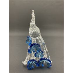 Swarovski Crystal animals, comprising white peacock, the tail with cascading blue flowers, perched eagle with yellow beak, ibex with frosted crystal horns and unicorn with frosted crystal horn, tallest H13cm