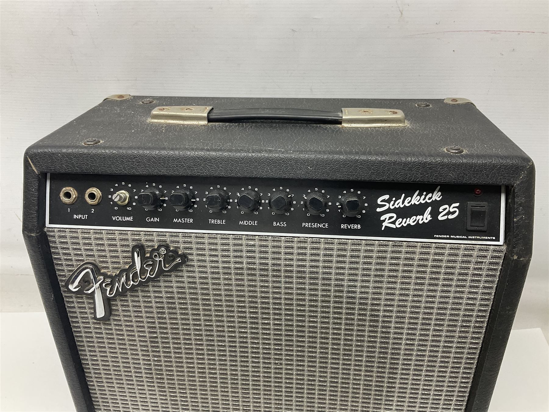 Aria Sinsonido mahogany electric travel guitar, serial no.0502385 L86cm; in original gig bag with earphones and GM11 Minituner; together with Fender Sidekick Reverb 25 amplifier and Marshall MG Series 15DFX amplifier (3)