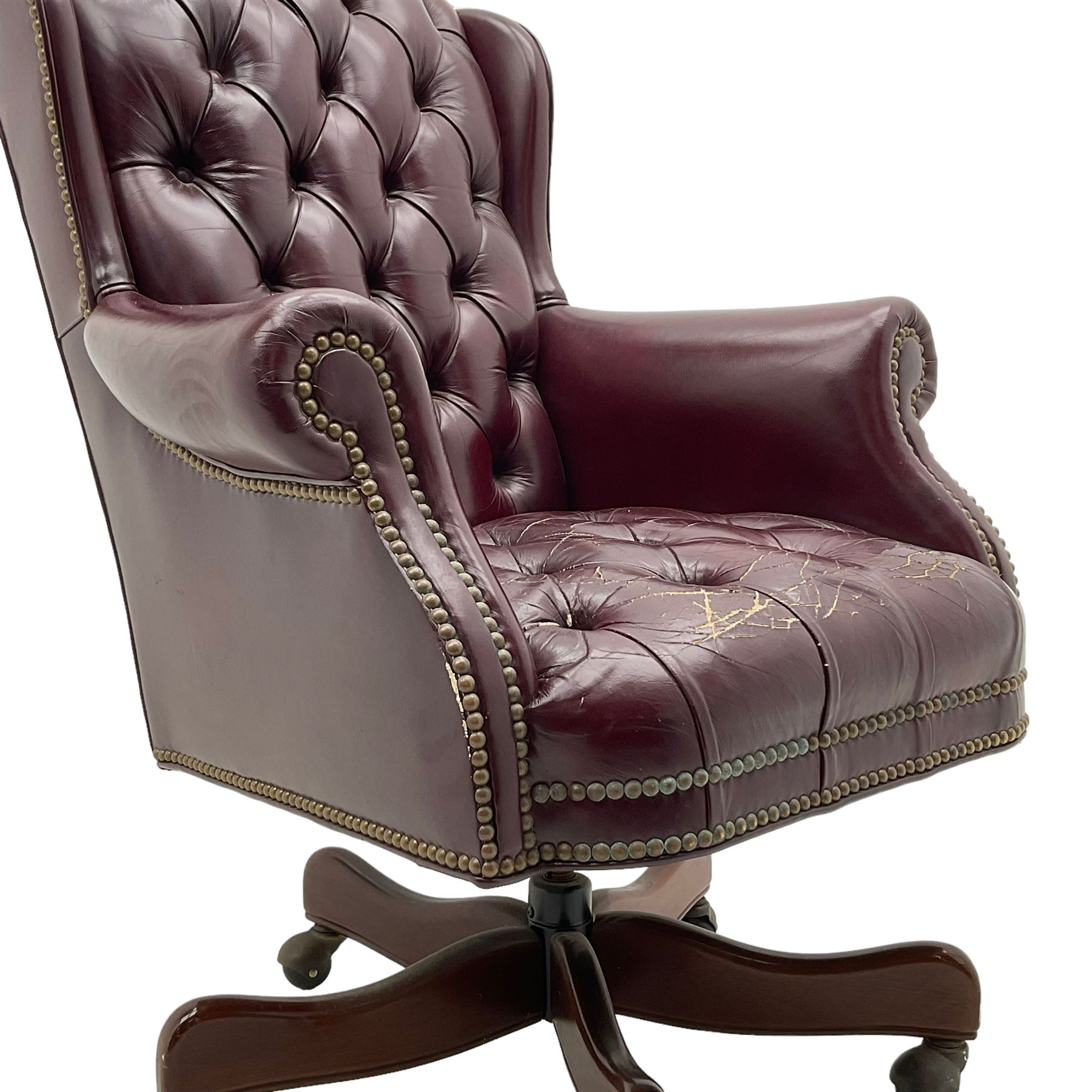 Hancock & Moore - swivel office desk chair, upholstered in buttoned burgundy leather with studded bands, five-spoke base on castors
