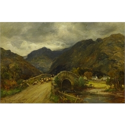 Owen Bowen (Staithes Group 1873-1967): Sheep crossing a Stone Bridge in the Lake District, oil on canvas signed and dated '07, 39cm x 60cm



