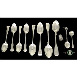 Group of assorted Victorian and later silver spoons, comprising pair pf Old English pattern teaspoons, hallmarked Josiah Williams & Co, Exeter 1877, two Fiddle pattern teaspoons, hallmarked London 1860, probably A B Savory & Sons, and Henry Holland, London 1877, four Edwardian coffee spoons, hallmarked Josiah Williams & Co, London 1907, late Victorian salt spoon, early 20th century coffee spoon with animal terminal, plus an Edwardian silver thimble, and an Edwardian silver and enamel royal commemorative brooch, approximate total gross weight 4.85 ozt (151 grams)