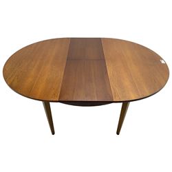 G-Plan - mid-20th century teak extending circular dining table, with concealed additional leaf (W114cm, H72cm); and a set of four mid-20th century teak dining chairs, seat upholstered in beige fabric