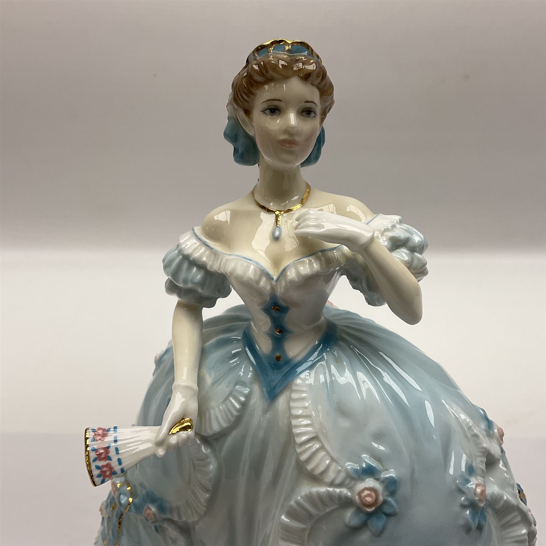 Three Royal Worcester figurines,  The First Quadrille, The Fairest Rose and Queen of Hearts, largest H21cm