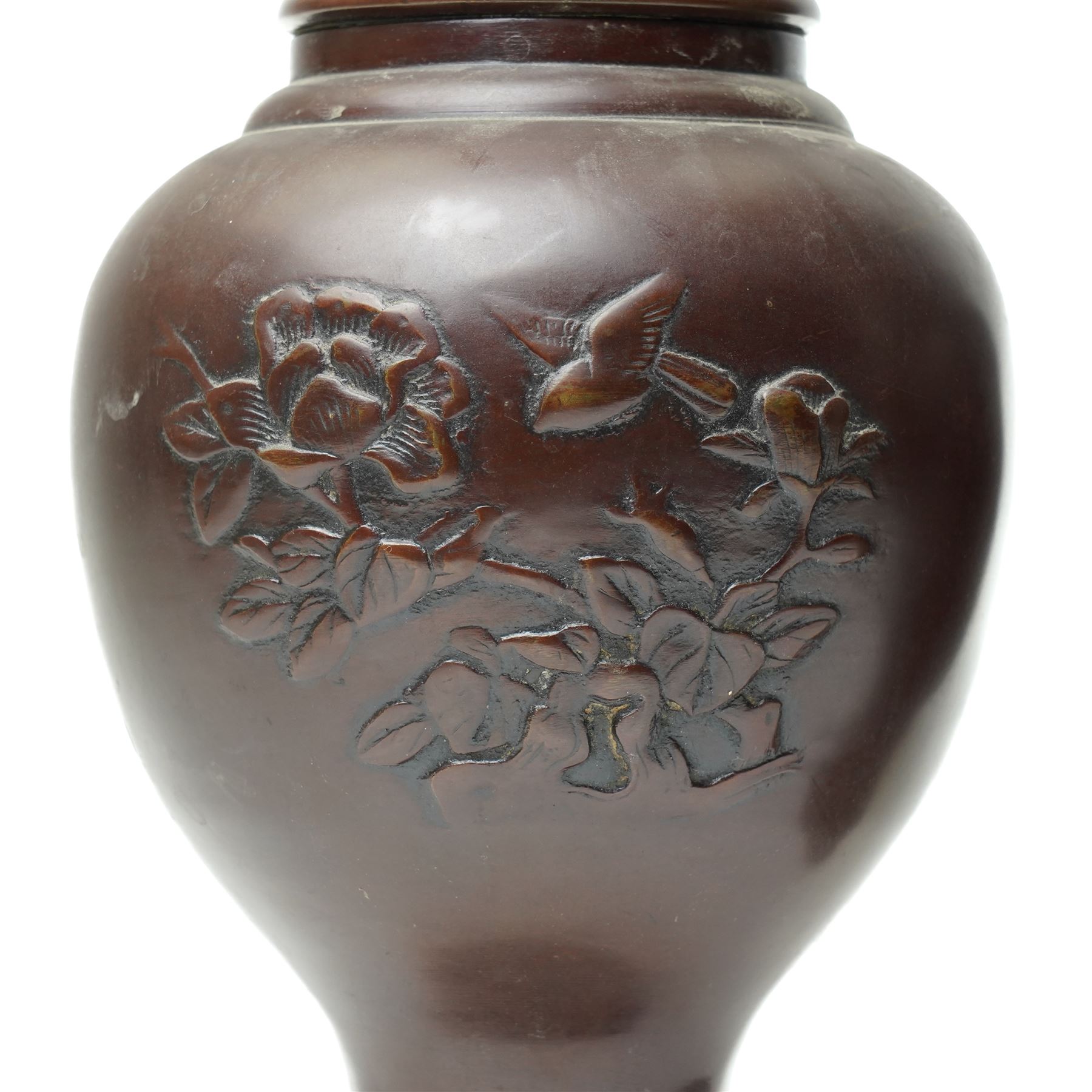 Pair of Japanese bronze vases, with twin handles in the form of dragons, decorated with flowers and traditional motifs to the neck and body, H31cm (2)