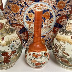 Collection of Japanese ceramics comprising pair of Satsuma vases decorated with panels depicting children and samurai figures, together with a Kutani vase painted with birds and flowers, all with painted character marks beneath, and an Imari plate, largest vase H31cm