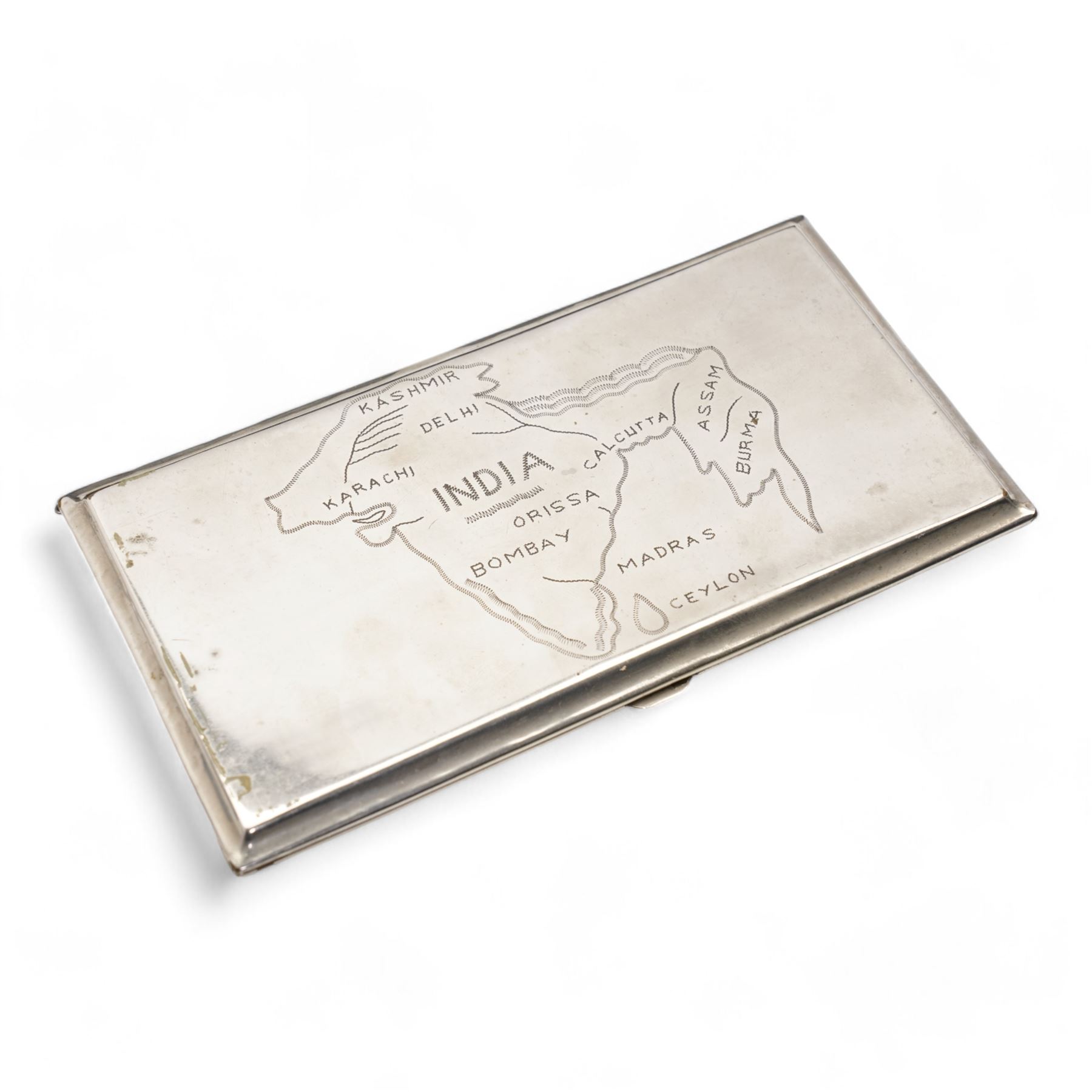 Masonic leather regalia case for De Lacy 4643 Lodge, containing a Masonic apron, By-Laws and Constitutions, gloves and cufflinks etc, with the original Toye, Kenning & Spencer Ltd box, together with three silver cycling medallions, brooch and silver plated cigarette case engraved with a map of India