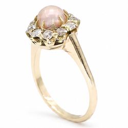 Gold pearl and diamond cluster ring, single pink pearl surrounded by ten old cut diamonds, stamped 14K, total diamond weight approx 0.60 carat