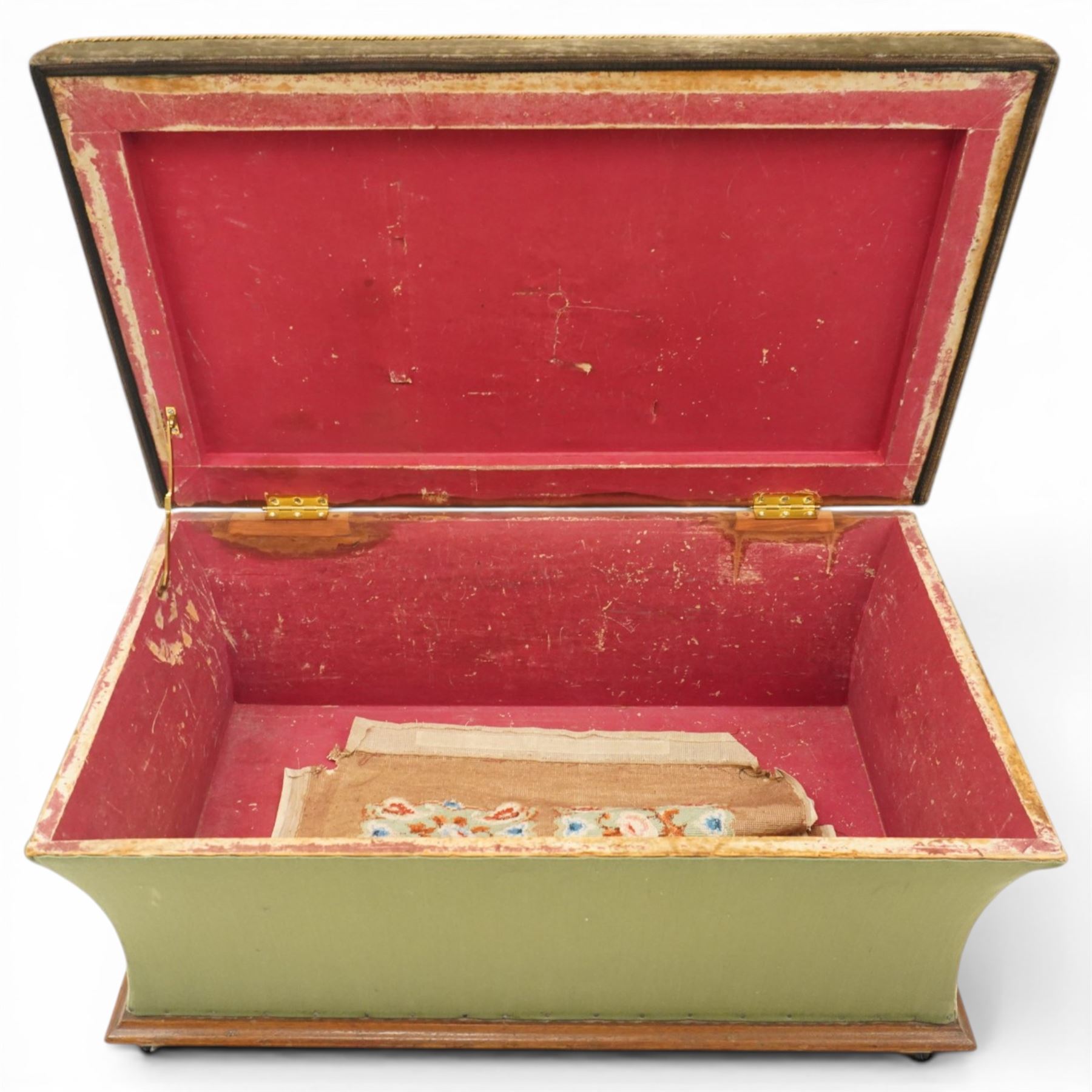 Victorian Ottoman with tapestry cover, with multicoloured geometric needlepoint cover, hinged to reveal a pink paper lined interior, the base covered in green velour fabric, raised on later castors