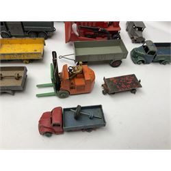Dinky - twenty-six unboxed and playworn die-cast models including Foden Regent Tanker, two Foden lorries, Pressure Refueller No.642, Snow Plough, Elevator Loader, Foden Dump Truck, Blaw Knox Bulldozer and other commercial vehicles