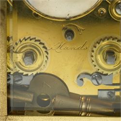 Early 20th century carriage clock, the white enamel dial inscribed F G Russell, Malvern with bell strike in brass and bevelled glass case H12cm