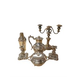 Silver plated items, including cocktail shaker, candelabra, pair of candlesticks, coffee pot and serving dish