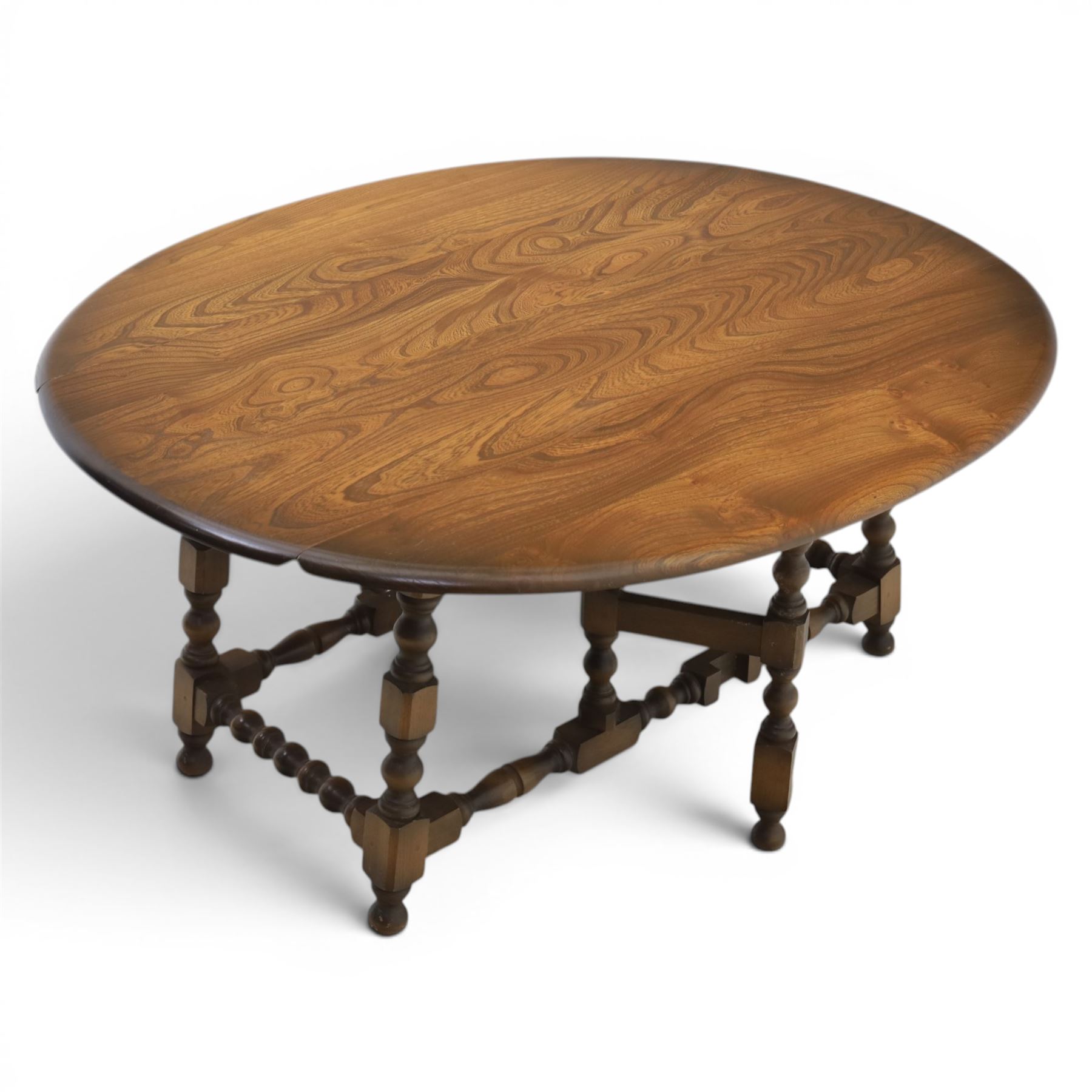 Ercol - elm oval/rectangular drop leaf coffee table, bobbin turned base