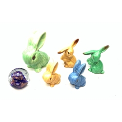  Five Sylvac Rabbits, to include a large example marked 1026, etc., together with a Caithness glass paperweight.   