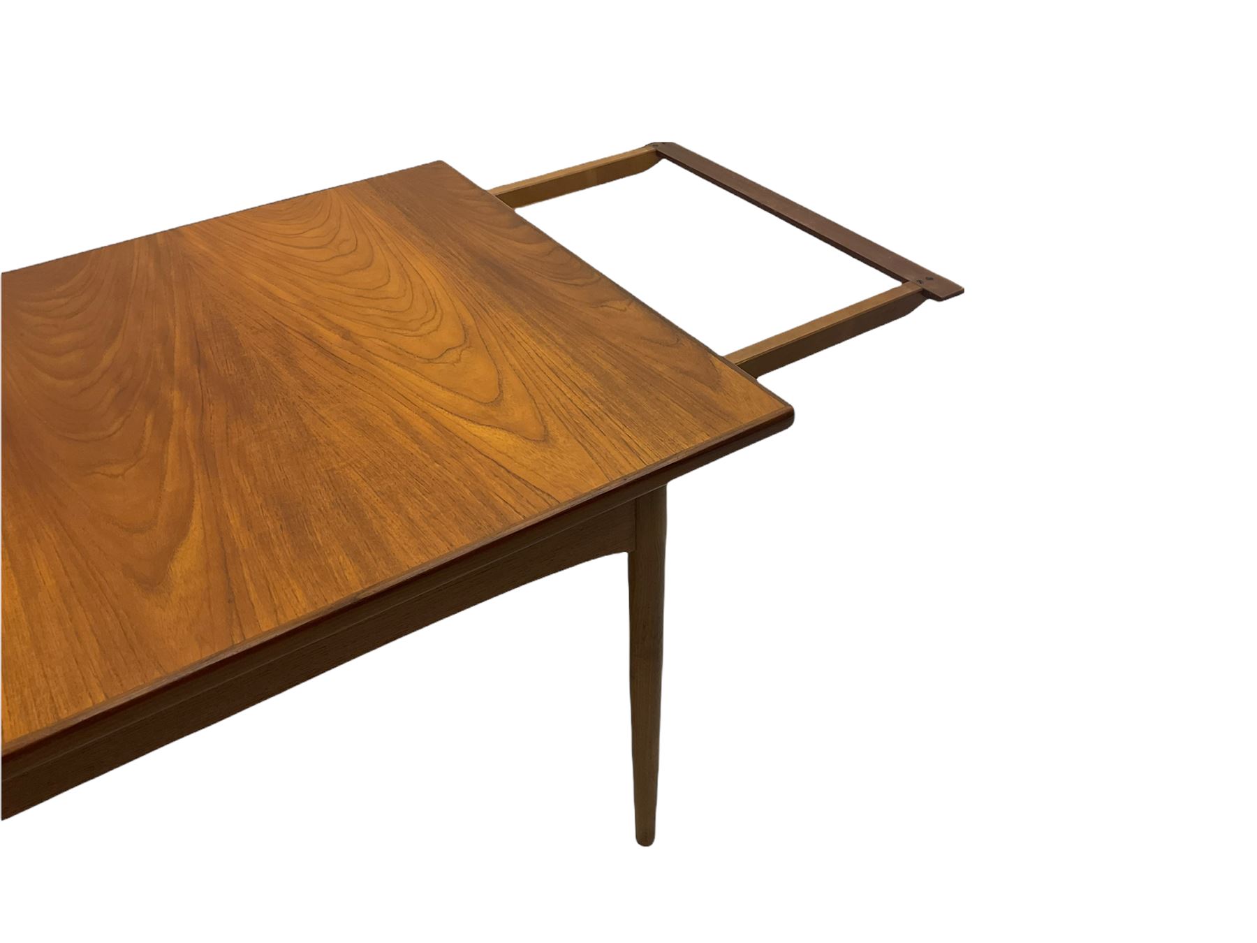 GPlan mid 20th century teak dining table, extending with two leaves