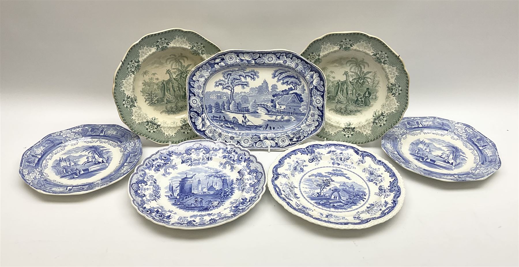 A pair of John Ridgway soup bowls, transfer printed in green with the Giraffe pattern, together with a group of other 19th century blue transfer printed wares, including a pair of Walmer pattern dinner plates. 