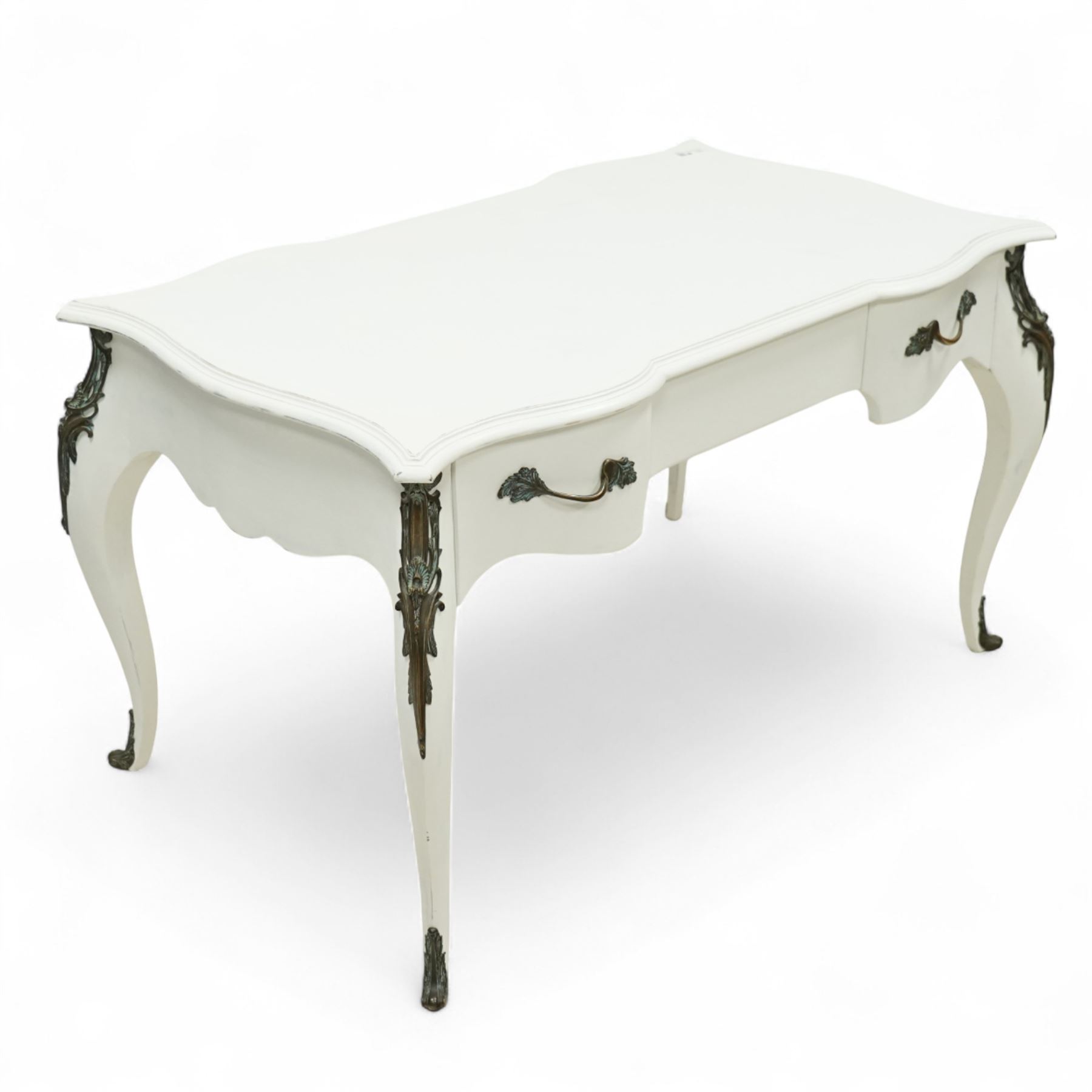 And So To Bed - French design white painted dressing table, serpentine top over two drawers, with decorative mounts and shaped cabriole legs