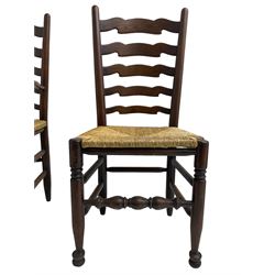 Set eight (6+2) oak dining chairs, high waived ladder back over rush seats, raised on ring turned supports with pad front feet, united by stretchers