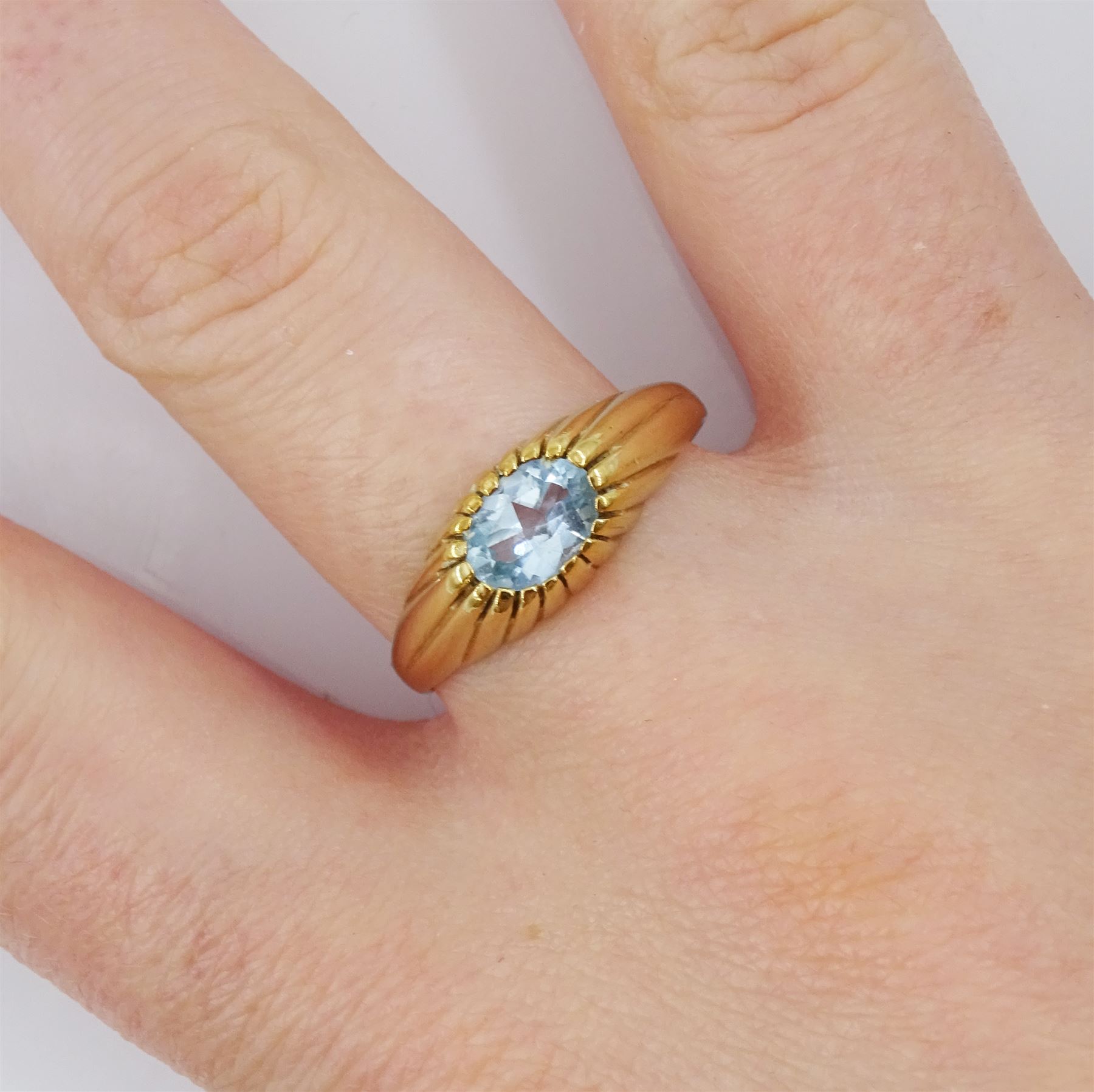 9ct gold single stone oval aquamarine ring, hallmarked