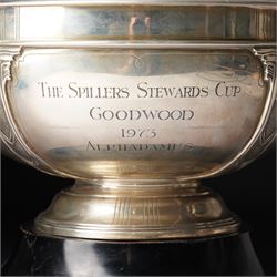 'The Spillers Stewards Cup, Goodwood 1973 Alphadamus' - Silver two handled rose bowl with lappet design on a short pedestal foot and ebonised plinth D28cm London 1958 Maker Edward Barnard & Sons Ltd
NB Alphadamus won the Stewards Cup in 1973 and provided Sir Michael Stoute with his first major career success.  