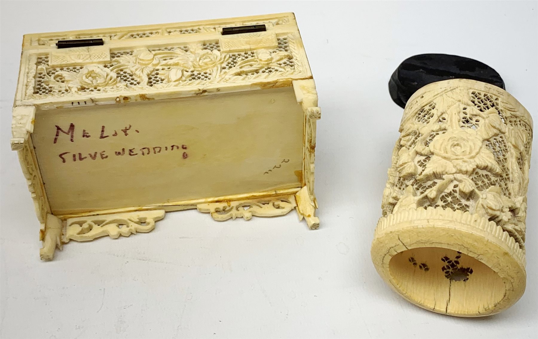 19th century Cantonese carved and pierced ivory small trinket box, L13.5cm and a similar cylindrical vase on hardwood stand H11cm (2)