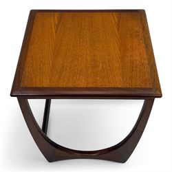G-Plan - 'Astro' mid-century nest of three teak occasional tables, each with a square top with outer banding, on U-shaped end supports united by a stretcher
